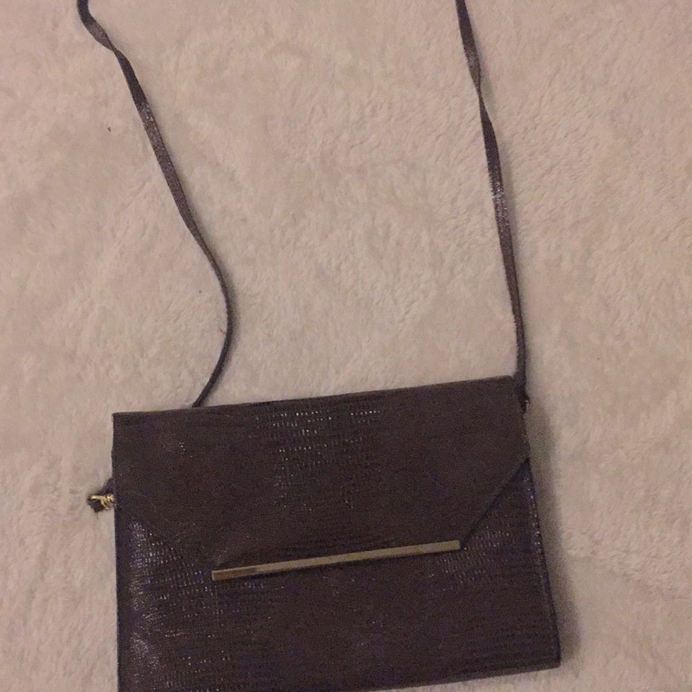Clutch with strap